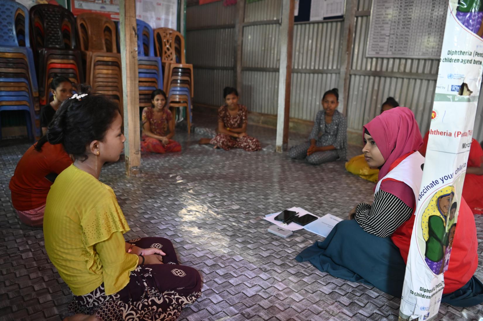 A Volunteer runs a Peer-to-Peer Session for Rohingya Children