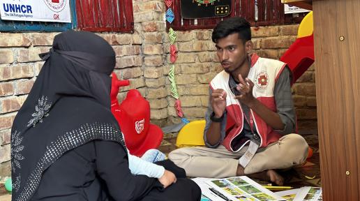 Nur Kalam conducts a counselling session with a Rohingya refugee at a community health centre in Cox's Bazar